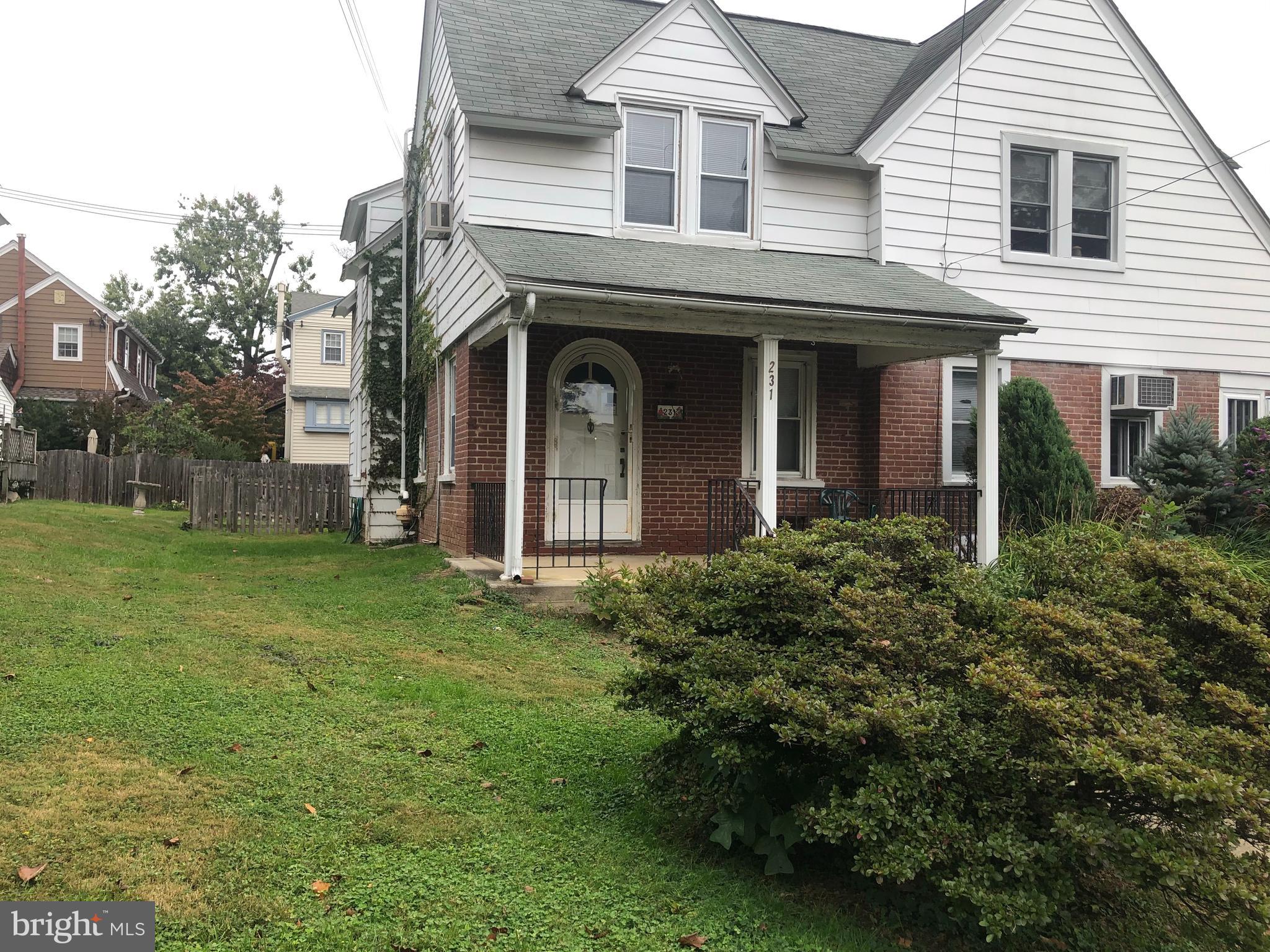 An inviting front porch with arched door welcome you into this 3BR 1.5BA twin in the heart of Wynnewood. Enter a spacious LR with red brick fireplace; DR with stained glass windows; Kitchen with a breakfast island, custom-built glass cabinets, access to laundry room with half bath. Out entrance to a brick patio, large fenced backyard, brick walkway to alleyway and detached one-car garage with newer door. Charming banister leads to 2nd floor with sunny MBR with closet, hall bath, and 2 additional BRs. An unfinished basement with high ceilings completes this home. All new windows throughout, ceiling fan in each room, radon remediation completed, sump pump. One block from Penn Wynne Elementary, walk to library and parks. The property is sold in as is condition. Looking for a buyer immediately!