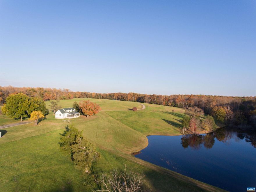 Haymaker Farm is the rare offering providing complete privacy, water views and a beautifully restored 18th century home, equidistance between Charlottesville and Richmond. Mature hardwoods open up to rolling fields and four beautiful ponds.  Abundant wildlife and natural beauty with miles of trails. The well proportioned 4/5 bedroom home has been meticulously restored and is ready as a primary residence or weekend getaway. Great proportions, beautiful porches with water views. Stable and farm buildings add to the meticulously maintained property.  Would make an excellent horse property with easy access to I-64 (three miles away) or as a cattle or working farm.  Endless possibilities.  Excellent candidate for conservation easement.,Glass Front Cabinets,Granite Counter,Marble Counter,White Cabinets,Wood Cabinets,Fireplace in Study/Library