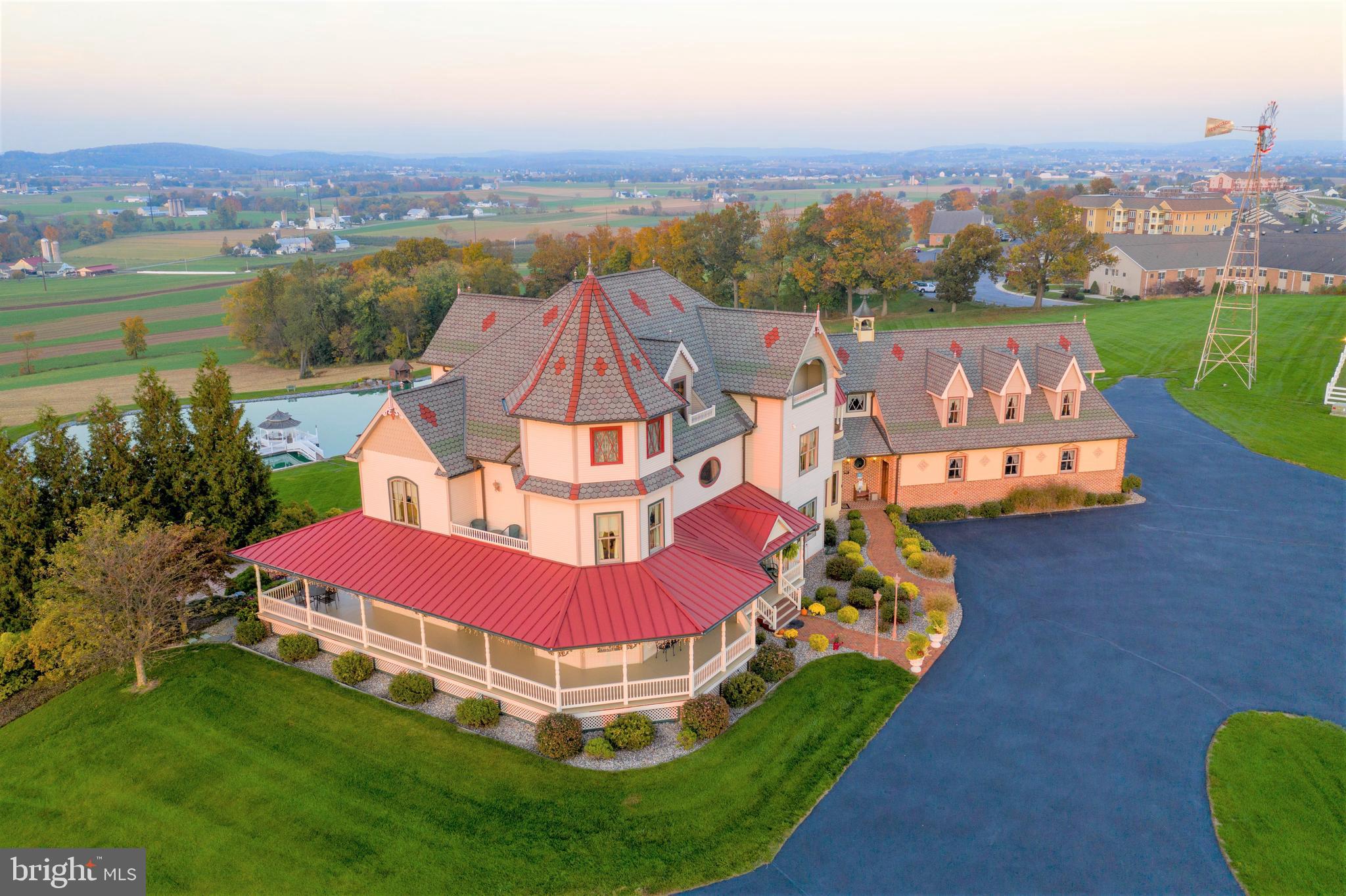 PROPERTY IS GOING TO AUCTION ON SATURDAY MAY 29, 2021 @ 1:00 pm. CONSIDERING OFFERS OVER $1,500,000. THIS PRICE REFLECTS A POSSIBLE STARTING BID AT THE LIVE ON-SITE AUCTION. PROPERTY CANNOT BE SOLD BEFORE THIS SCHEDULED LIVE AUCTION. This truly is an opportunity to buy a one-of-a-kind property! Numerous upgrades through-out include an elevator to all 4 levels, custom real wood trim, tailored solid oak interior doors w/custom brass hardware, brick & vinyl exterior, abundant closets, lawn & flower bed sprinkler system, intercom system, water softener, 2 private wells & septic system, water treatment system, geo-thermal heat & cooling system, central vac system, charming newer wind-mill, helicopter landing area or ideal location for weddings or events. Part of property is in Clean & Green. This magnificent property offers the best of luxury, the best of panoramic views and the best peaceful living, the best covered porch all in one awesome location!