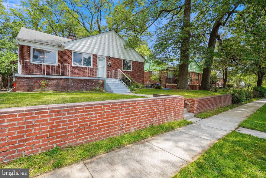 Gorgeous 3+ bedroom, 2 full bath rambler in Takoma Park.  Beautifully painted with light grey and white trim throughout the entry level.  Fully refinished and gleaming hardwood flooring upstairs.  3 bedrooms  and a full bath on the main floor.  The kitchen has all stainless steel appliances and is newly repainted including all white cupboard doors with new hardware.  
The lower level has two entrances.  One is connecting but another is a completely separate entrance from the fenced back yard.  You enter into a large ceramic tiled family area with what could be described as a full, in-law suite including a kitchen and a full bath with 2 bonus rooms and a separate laundry area.  
There is a walk-up attic with plenty of space for storage.  A wonderful, move-in ready home centrally located and close to DC.