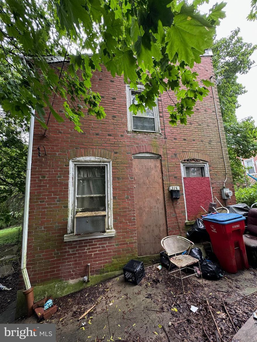 Vacant single family family house. In shell condition and needs full renovation. Tucked away in the back of 
the middle of the block. Could potentially be a good rental and or flip.