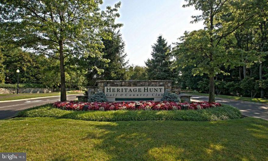 This is the ONLY condo unit currently for sale in     Heritage Hunt. Beautifully maintained, this 2 Br/2  Ba home has recently been upgraded with hardwood floors, new bedroom carpet, and luxurious white granite in the kitchen. Additionally, the      kitchen boasts more cabinet, drawer, and counter space than the builder ever designed. The large            balcony overlooks the golf course and a wooded    area which provide total, quiet enjoyment year-      round. The hot water heater is two years old. The condo comes with one assigned parking place      (#18) in the garage and unlimited street parking   in the front of the building. 24 x 7 manned gate    security and controlled access to the building         provide added peace of mind. Golf Club member-   ships are available and the Clubhouse boasts a       wonderful dining and entertainment opportunity. Condo fee provides for land-line telephone, cable TV (Comcast), WiFi Internet connectivity, trash     pickup, and water. For the past year, electric and   natural gas COMBINED have averaged $100 per    month. Additional, ample, private storage room   on garage level with shelving.