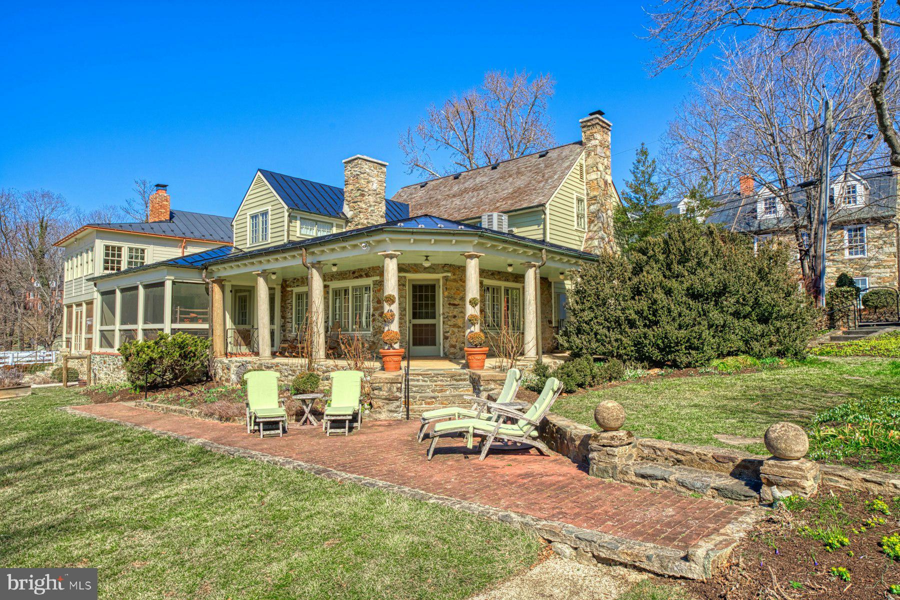 The Griffith Gover House dates back to the late 1700s. Backing to the preserved 144 acres of Phillips Farm enjoy never changing views of wildflower fields and the Mill Chase. Totaling over .67 acres of formal gardens and hardscape that give way to whimsy with the early 1900s dance pavilion and masonry megaphone used during its years as a boarding house. This property brings the outside in with formal living spaces opening to porches, amazing views of the gardens and incredible light in every season. In 2000, the house underwent a meticulous multi-million-dollar renovation, restoring the infrastructure from the ground up with master craftsmen incorporating historical accuracy with modern purpose. This once-in-a-lifetime home is complete with an exquisite English Hartley Botanic greenhouse, stone guest cottage and ample off-street parking, a rare feature in the village.