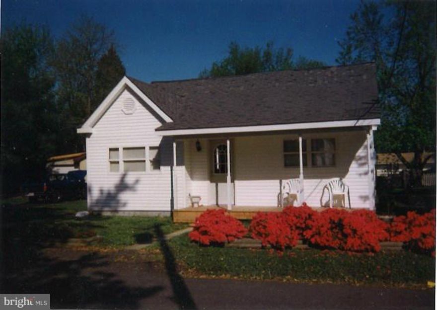 Charming Cottage with view of St. Clements Bay. This 2 bedroom 1 bath home features an eat-in kitchen and living room with vent free gas fireplace. Also includes a detached garage, shed and rear deck.