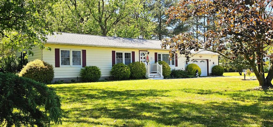 Beautifully maintained home and property.  This 3 bedroom 1 bath home with enclosed patio, greenhouse and "she shed" offers you space to relax, unwind or entertain in the spacious fenced backyard.  Close to water access for boating, fishing and crabbing. New roof in 2024, Well upgrade in 2023,  Septic inspected and upgraded 2025 and cleaned 2026