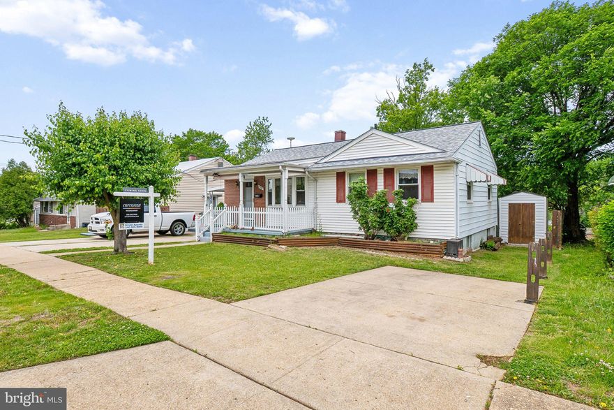 Welcome to 7302 Powhatan Street, a well-maintained 3-bedroom, 2-bathroom home offering 950 square feet of living space in Lanham, Maryland. This property combines practical features, flexible spaces, and convenient amenities, making it a strong option for both everyday living and entertaining.

The main level features hardwood flooring. The living area is enhanced by a ceiling fan and direct access to a covered deck, extending the living space and providing a comfortable area for year-round use. The adjacent eat-in kitchen includes a breakfast, ample cabinetry, and room for casual dining.

The finished, walk-out basement adds valuable additional living space, suitable for a recreation room, home office, or guest area. Wall-to-wall carpeting creates a warm, quiet environment, and the lower level also provides direct access to the backyard. The workshop area in the basement support hobbies, projects, and extra storage needs.
Outdoor spaces are a key highlight of this property. The covered deck, with its two ceiling fans, overlooks a beautiful, fenced backyard, offering multiple areas for relaxation, gardening, or play. Two carports provide parking. Two exterior storage sheds add to conveniency.

Additional features include forced air heating, other A/C cooling, municipal water, and public sewer service. The home's layout and features support comfortable daily living with the flexibility to adapt to a variety of needs.

Make this house your home with your personal touch. The roof is 3 years old; the furnace and HVAC are newer. This property is offered for sale As-is and presents a solid opportunity to own with finished indoor space, multiple outdoor living areas, and practical amenities in Lanham, MD.  1 year Home warranty offered by seller.