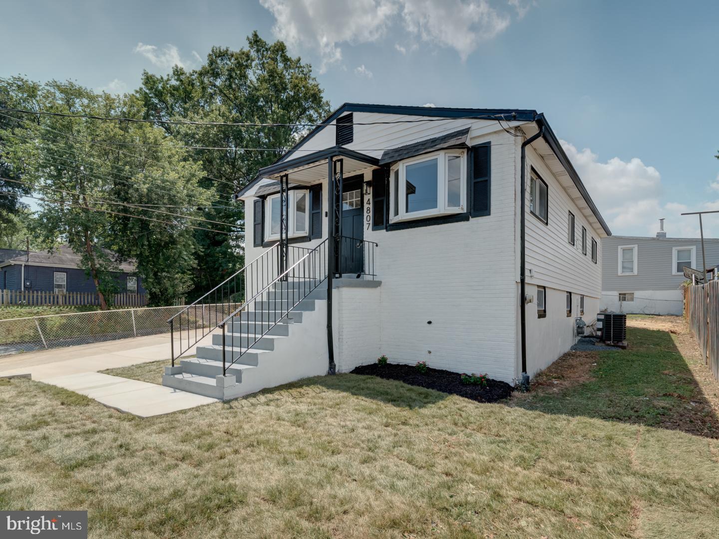 OPEN HOUSES ** SATURDAY AUG 23 FROM 1 to 3PM! ** SUNDAY AUG 24 FROM 12 to 3PM! **
Welcome to this beautifully updated 3-bedroom, 2-bath single-family home that combines modern upgrades with timeless charm. The main level features gleaming hardwood floors and a bright, open layout that flows seamlessly into the renovated kitchen. With crisp white cabinets, quartz countertops, stainless steel appliances, and a spacious island, the kitchen serves as both the heart of the home and a perfect gathering spot. Three comfortable bedrooms and a full hallway bath complete this level, all freshly painted in a clean, modern palette that creates a warm and inviting atmosphere.
The fully finished lower level adds tremendous living space, featuring a large family room, two versatile flex rooms ideal for an office, gym, or guest space, and a full bathroom for added convenience. A dedicated laundry room and a stylish wet bar make this level both functional and perfect for entertaining.
Outside, the home offers a brand-new concrete driveway with ample parking for multiple cars, as well as a new roof for peace of mind. Whether hosting gatherings, relaxing with family, or enjoying the upgraded finishes, this home is move-in ready and designed to fit today’s lifestyle.