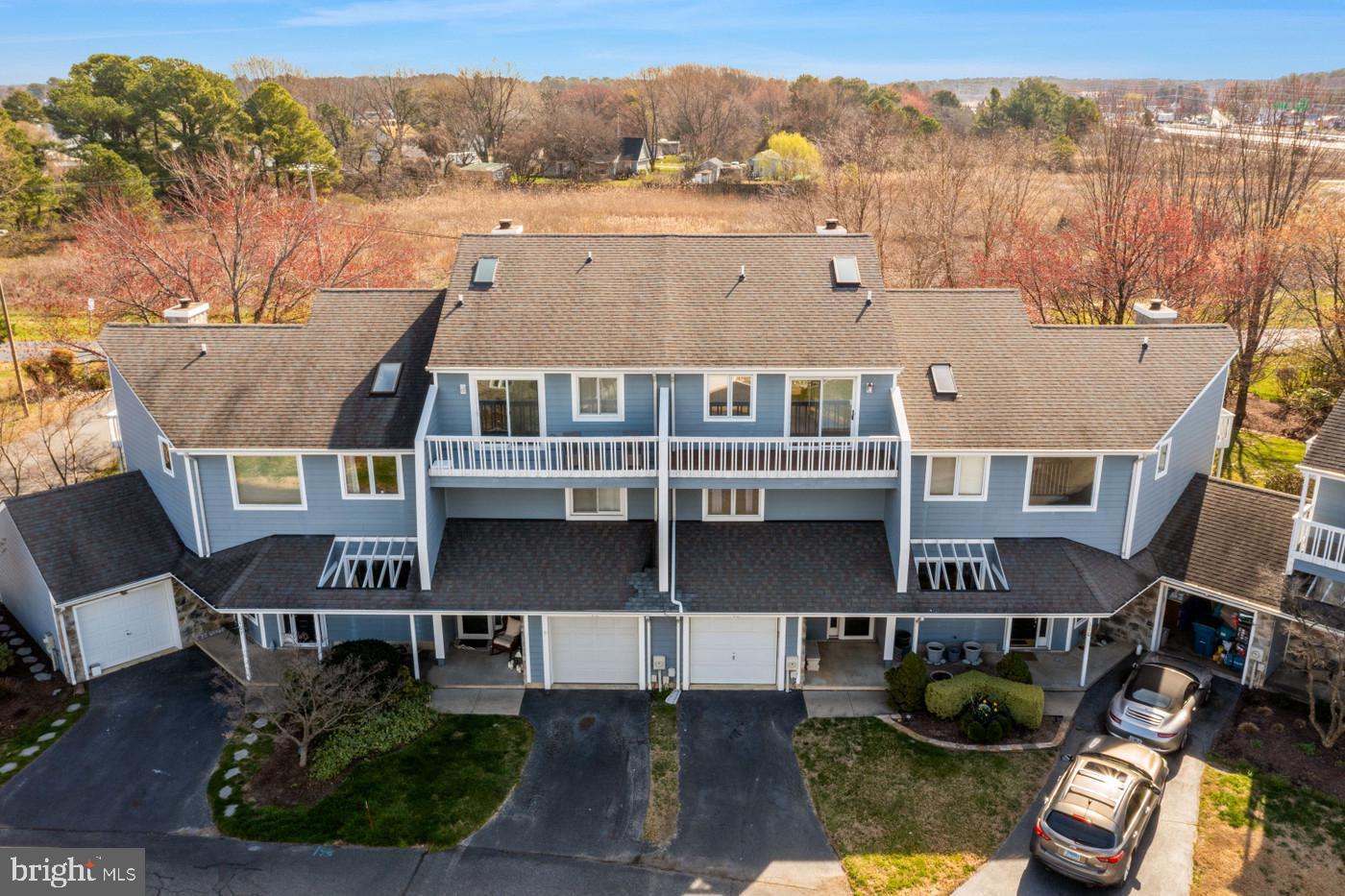 **Water privileged** Included Boat Slip** Bayview @ Kent Narrows - Waterfront Community - Renovated Contemporary Townhouse with Boat Slip - Located just over the Kent Narrows Bridge on Maryland's beautiful Eastern Shore this 3 Bedroom, 3.5 Bath Contemporary Townhouse with Garage awaits a very special buyer. Features beautiful NEW kitchen with gray shaker cabinets, granite counters and new stainless steel appliances, NEW Luxury Vinyl Plank flooring in the Living Room, Dining Area, Kitchen and Primary Bedroom. The Primary Bedroom is spacious and bright with vaulted ceilings, ceiling fan, double closet + walk-in closet and dressing area. Features a gorgeous NEW Primary Bathroom with luxury double shower with 2 shower heads, built-in niches, built-in benches and glass shower doors. There are 2 additional generous sized bedrooms & 2 additional Full Baths - one in the hall and one en suite to Bedroom 3. This spacious property offers you location to all the area Kent Island attractions, an assigned community boat slip + a storage lot for the off season and convenient access to Rt 50 going east or west. The community marina is at the far end of this private enclave of townhomes, and you would launch into Muddy Creek which feeds directly into the Chester River. From there you are literally 5-10 minutes by boat to Red Eye Dock Bar, Harris' Crab House and the new Dock House Restaurant. The community marina has water and electric. The monthly condo fee includes use of the marina. It is on a community well, public sewer (no future septic headaches!) and NOT in a flood zone. That's a big WOW and gives you security and confidence your investment is solid. This is a true beauty and makes for a lovely year- round or weekend home!