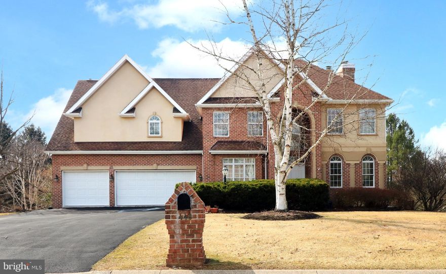 Exceptional Elegance in Centre Hills.  Nestled on a spacious .47-acre lot, this stunning all-brick 2-story home captivates with timeless curb appeal in the prestigious Centre Hills neighborhood. Designed with classic sophistication & luxury in mind, this residence boasts custom hardwood floors, arched doorways, soaring ceilings, built-ins, three fireplaces & an abundance of natural light throughout.  Offering three levels of exquisite living space, this home is designed for both comfortable everyday living & grand entertaining, especially during Happy Valley events. Step into the impressive 2-story foyer, where a formal living room welcomes you on one side & a formal dining room on the other. The breathtaking Great Room showcases a wall of windows, French doors leading to the rear deck & a soaring ceiling open to the second floor.  The chef’s dream kitchen is fully equipped with stainless steel appliances, a walk-in pantry, an oversized island with cooktop, crisp white cabinetry & Corian countertops. A charming dining nook with a bay window bump-out & a built-in desk area adds both charm & functionality. The large first-floor laundry/mudroom provides convenience, leading to the attached three-car garage, while a home office & a powder room complete the main level.  The beautiful staircase leads you upstairs, where you will retreat to the luxurious owner’s suite, featuring a vaulted ceiling, cozy fireplace, two oversized walk-in closets & a spa-like full bath with dual vanities, separate makeup area, Jacuzzi tub, glass block/tile walk-in shower & tile flooring.  3 additional bedrooms include one with a private full bath, while the other two share a well-appointed full bath with a dual vanity.  The walk-out lower level is an entertainer’s delight, featuring a spacious rec room with a wet bar, an additional full bath, and plenty of unfinished storage space.  Outside, enjoy the expansive rear deck and lower concrete/brick patio, offering a secluded backyard oasis—perfect for summer gatherings. Additional amenities include Central Vac, a heat pump, and refreshing central air.  Ideally located just moments from Centre Hills Country Club and golf course, this home is a dream for golf enthusiasts. Plus, it's just 9 minutes from Penn State University & Beaver Stadium and 7 minutes from downtown State College, offering the perfect blend of luxury, space, and convenience in one unbeatable package.