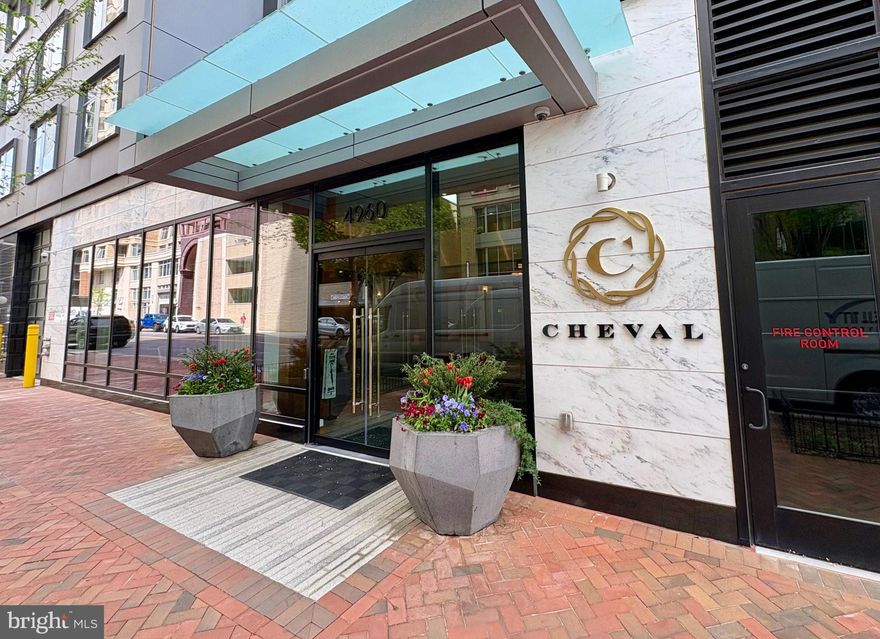 OPEN SAT NOV 1st, 1-3 pm! Come see Residence 706 at The Cheval, a luxury condominium offering modern elegance and effortless living in the heart of downtown Bethesda. Featuring floor-to-ceiling windows, upscale finishes, and an open-concept layout ideal for both everyday living and entertaining.
The sleek kitchen is outfitted with high-end appliances, quartz countertops, and custom cabinetry, opening to a spacious living area with sweeping views. The serene primary suite includes a spa-like en-suite bath and generous closet space. The versatile second bedroom is perfect for work and guests with a custom $14k Murphy bed which leaves the desk space in tact while it folds open to the bed. It’s super cool and easy to open! 
Included with the unit is a separately deeded garage parking space (P3-12) close to the elevator equipped with an EV charger, a private storage unit (S-11), and two designated bike storage spots.
The Cheval residents enjoy top-tier amenities including a 24-hour concierge, fitness center, party room, and a rooftop deck with grills, bar seating, and panoramic city views. The monthly condo fee covers building maintenance, management, insurance, water, sewer, trash, and more. Must see!