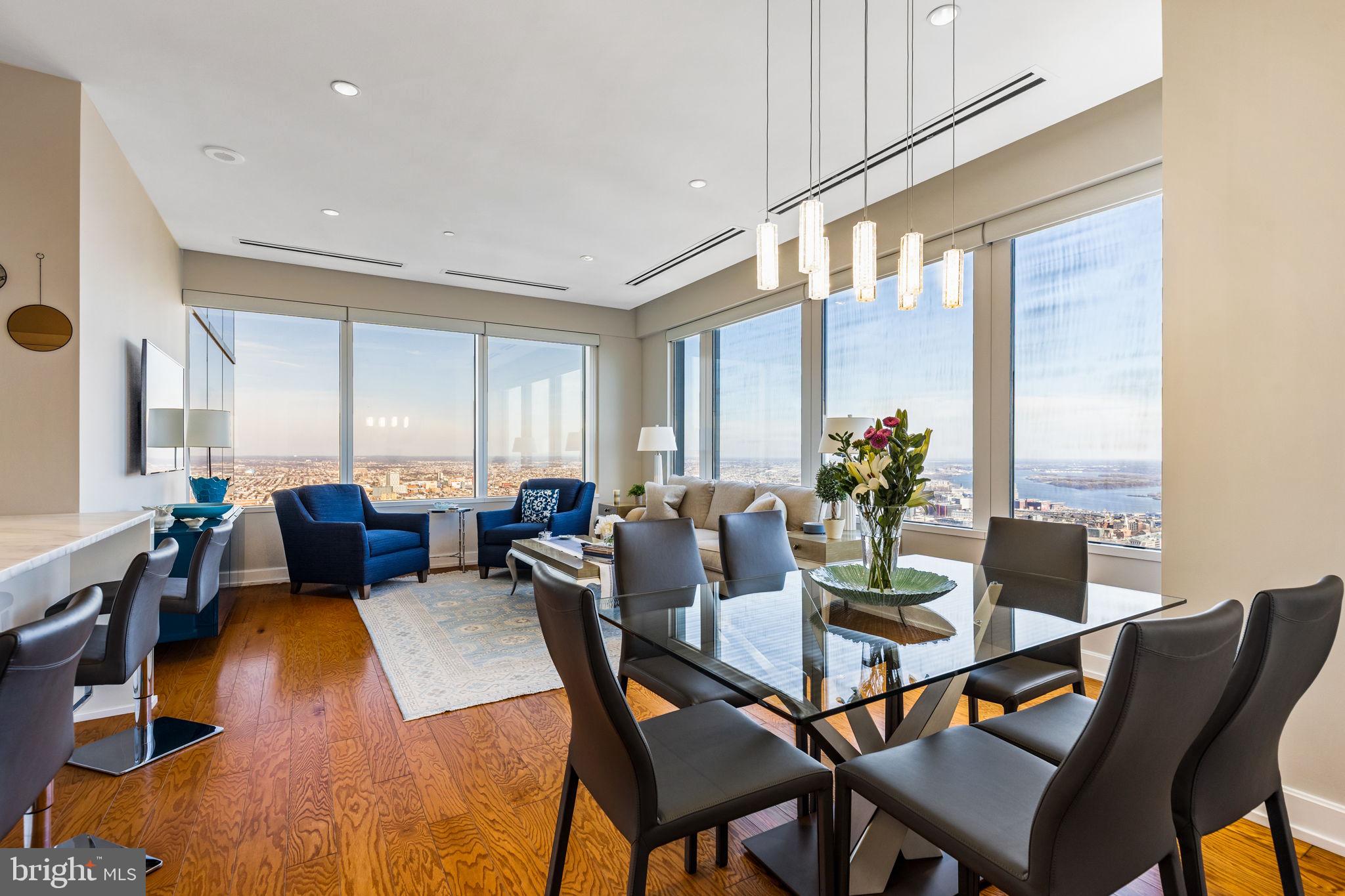 Experience unparalleled luxury at The Residences at Two Liberty Place, one of Philadelphia’s most iconic addresses. This 51st-floor unit offers breathtaking east-facing panoramic views of the city skyline and beyond. Spanning 1,140 sq. ft., this two-bedroom, two-full-bath residence boasts a sleek, modern design with high-end finishes throughout. East and South facing windows flood the space with natural light, showcasing the cityscape from sunrise to sunset. The open-concept living and dining area is perfect for entertaining, complemented by a gourmet kitchen with top-of-the-line appliances, custom cabinetry, and premium countertops. The primary suite features stunning views, a spa-like ensuite bath with a soaking tub, glass-enclosed shower, and double vanity, and generous closet space. The second bedroom is equally well-appointed, ideal for guests or a home office. As a resident of this Dranoff-developed luxury high-rise, you’ll enjoy world-class amenities, including 24-hour concierge and valet service, a state-of-the-art fitness center, and access to the newly renovated residents’ lounge on the 37th floor. Located in the heart of Center City, Two Liberty Place is steps away from the finest dining, shopping, and cultural landmarks Philadelphia has to offer. Elevate your living experience in this premier residence—schedule your private showing today!