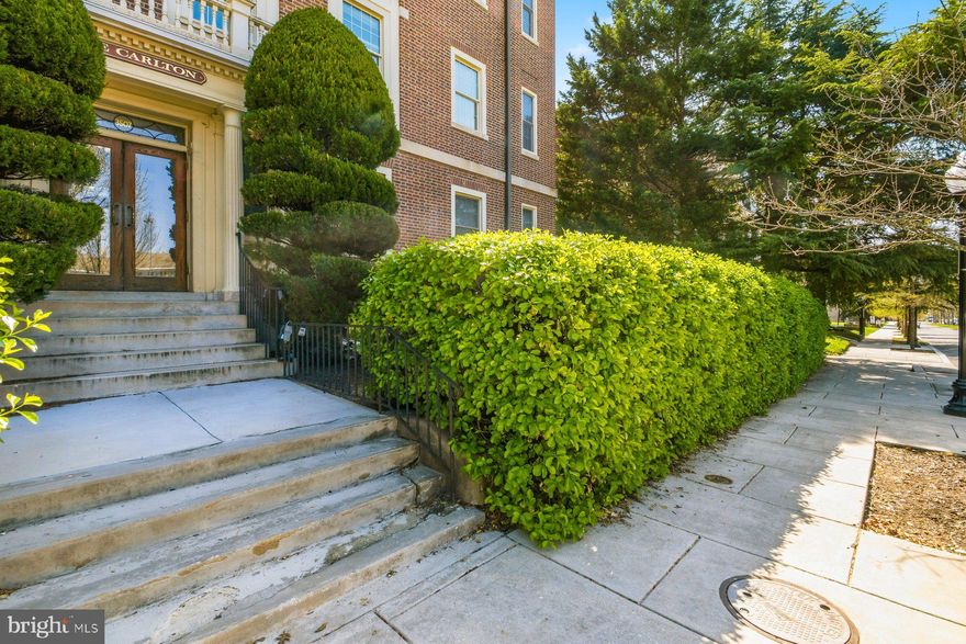 Situated on the third floor of The Carlton, this 3-bedroom, 1-bath residence offers a blend of classic charm and everyday practicality in a prime location just moments from Johns Hopkins University. This 1300 s.f. apartment in this grand Georgian Colonial with many of the original features still intact,  Heat and water included in your condo fee. The kitchen is renovated with granite countertops with the original butlers pantry adding charm. For your convenience there is was.  Oak floors, high ceilings and an ornamental fireplace make this pleasant unit warm and elegant. Extra storage in lower level as well as the laundry room. Come enjoy the vitality of city living and the elegance of 1916 architecture. Window air conditioning units provide seasonal comfort. Ideally positioned for easy access to Charles Village shops, dining, and green spaces, this home offers a comfortable city lifestyle with enduring architectural appeal.