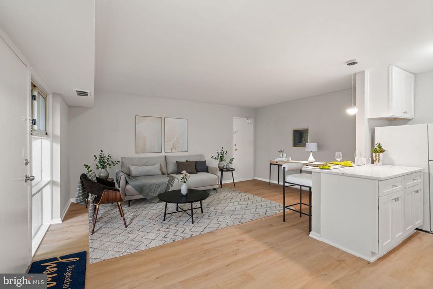 Welcome Home to a main level condominium located in the heart of Annandale, thoughtfully designed for comfort and ease. Perfectly located near 495, retail, dining & shopping destinations. This sun-filled, fully updated in 2024 offers a 1-bedroom, 1-bath home delivers exceptional convenience and a lifestyle you’ll love. Enjoy the dual access through your private patio door or the interior building entrance leading into a bright, open living space filled with natural light and wide window views of the greenery outside. The fully updated kitchen with new vinyl plank flooring, upgraded cabinets, granite countertops, new appliances, and a spacious breakfast bar ideal for entertaining. The spacious bedroom includes a walk-in closet and an updated full bath. A low condo fee covers water, gas, and the value of an extra storage. The community offers walking paths, parks, and a seasonal pool, plus convenient access to all the activities and amenities that make the Annandale and Fairfax area such a vibrant place to live.