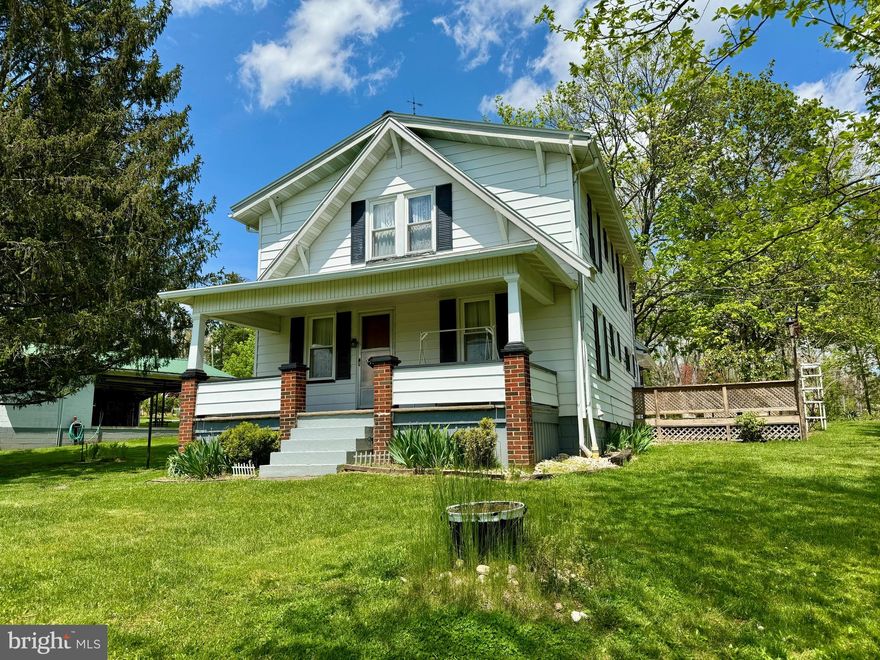 Looking for your home sweet home on a little bit of land, look no further. This charming two story 4 BR, 3 BA home is situated on 1.31 acres in a country setting, close to town, and an easy commute to State College. The kitchen offers an open layout to the dining area with a 1/2 bath conveniently located on first floor. The upper section of the lot has potential to be subdivided with access to public sewer. This home boasts a deck with a view, as well as a front porch and back patio. Added bonus is a detached heated workshop with a two-car carport, as well as an additional heated garage with air compressor included, separate electric, and two open side sheds. Bring your vision, and make this home your very own home sweet home.