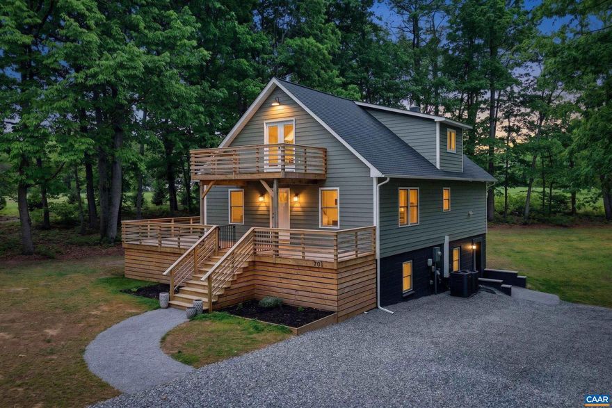 This is where dreams come true! Completely remodeled from top to bottom, this stunning 5-bedroom, 2.5-bath home truly has it all. Step inside to find LVP flooring throughout, vaulted ceilings, and a bright open-concept layout featuring a spacious kitchen with pantry?perfect for entertaining. The oversized primary suite offers a private retreat with a beautifully tiled shower, while large bedrooms and multiple walk-in closets provide space for everyone. Upstairs includes 2 bedrooms with a huge shared bathroom, and the fully finished walkout basement adds even more living space with 2 additional bedrooms, a family room, mechanical room, and laundry. Situated on a 1.5-acre corner lot with divsion potential, enjoy outdoor living with expansive deck space, a garden shed, and plenty of room to spread out. The 2-car garage includes a workshop with separate power?ideal for hobbies or storage. Major updates include newer HVAC, roof, and windows, plus durable Hardie Plank siding for peace of mind. A rare find with space, updates, and flexibility?don?t miss this one!