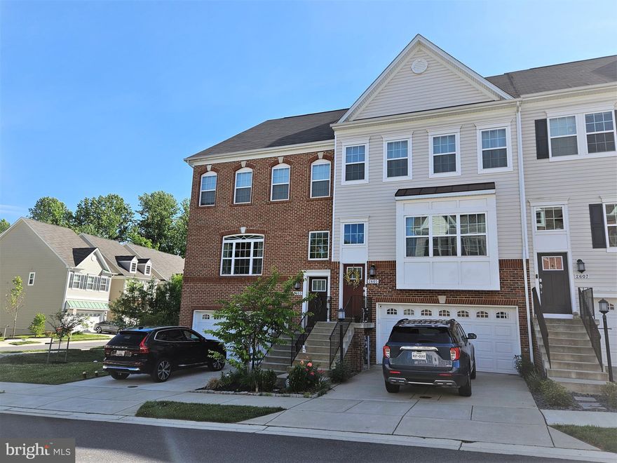 Gorgeous BETTER THAN NEW End of Group LUXURY Townhome with 3 Bedrooms, 2 Full Baths plus 3 Half Baths!  A total of 3,720 sf combined on 4 levels with a 9'x20' rooftop composite deck with vinyl railings!  Can you see yourself enjoying some star gazing after you catch a great movie in your 4th level entertainment loft! Updates include fresh paint throughout most of the home.  Beautiful open floor plan with laminate flooring on main level and ceramic tile in all baths. Gourmet Kitchen with tons of cabinets, a wine bar and a center island that is huge!  Stainless Steel appliances and check out that backsplash!  Just gorgeous everywhere you turn! Plenty of room to entertain guests in this stunning home!    A 2nd deck is just off of the great room on the main level to enjoy your morning coffee or dessert after dinner!  Primary bedroom has a sitting area, walk in closet and ensuite with a double sink and a shower that you can get lost in! LOL  Lower level game room has a walk out to the rear yard.  Don't miss out, this home is gorgeous and move in ready!  Located in Gambrills with a walking path to the Amazing Waugh Chapel Towne Center!