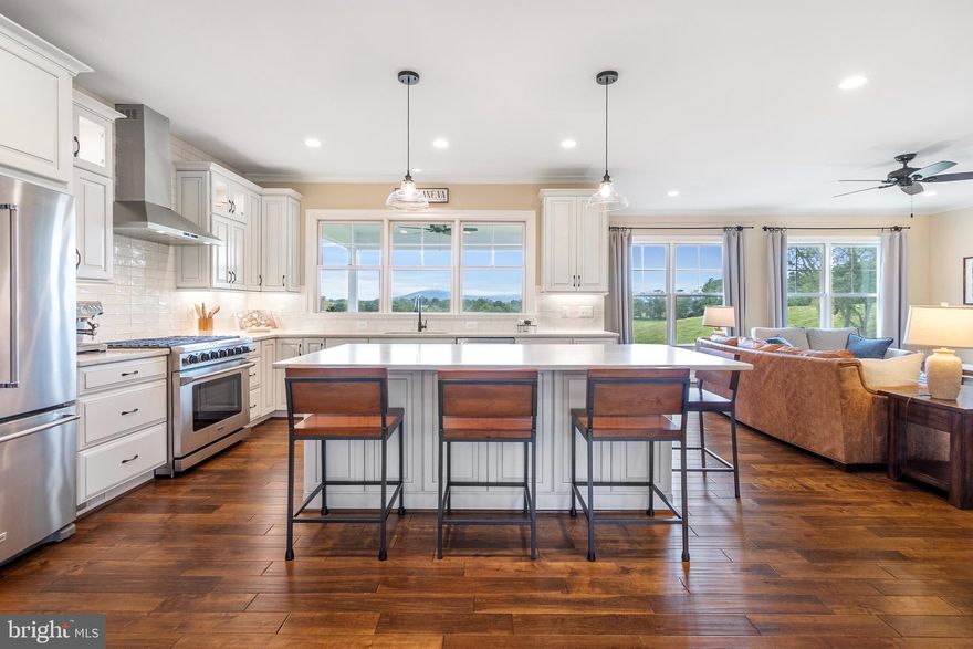 This is the most special gem with a million dollar view. Welcome to Simply Maidstone! You cannot find another property like this in all of Fauquier County! Located in the "Golden Triangle" north of I-66, near Upperville and Middleburg, Sky Meadows State Park, The Appalachian Trail, and the heart of Virginia Wine Country! Inviting open floorplan perfect for entertaining around the large kitchen island. Custom cabinets, quartz counters, 6-burner gas range, deep sink overlooking the Blue Ridge Mountains! Huge pantry with custom built, stained wood shelving, custom cabinetry, with sink and quartz counters. Main level primary bedroom with mountain views and private, luxury bath with marble counters, walk in closet with extensive custom built-in system. Custom shutters and blinds throughout. 5-inch, scraped birch wood floors flow throughout the main level. Separate in-home office space. Starlink for internet will convey! Two full bedrooms with mountain views upstairs (One en suite plus additional full bath, both with seamless shower doors). Loft area with mountain view makes a great extra hang out spot or place for extra sleeping. Additional finished basement with living/sleeping combo- could also make a fantastic wine room! Plenty of unfinished storage space with high-end radon system. Massive, oversized garage with epoxy floors currently used as a home gym. Garage is wired for a mini-split. Brand new Vivent security system. New asphalt driveway. Amish built shed. Chicken coop. RV Pad with electric, water, and septic. Property backs up to a roughly 364 acre farm and a 50 acre apple orchard next door. This property is perfect for developing an orchard or used for horses or other livestock. Though located in a rural setting, you are just a few minutes to I-66 to zip into Northern VA quickly or head west to I-81 or Front Royal in 15 minutes. Just 7 minutes to the town of Marshall. This is an incredible opportunity to affordably live in a peaceful retreat among multi-million dollar, exclusive estates!