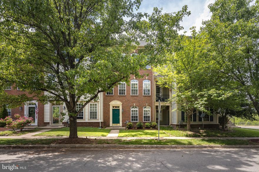 Beautiful 3-Level Townhome in Sought-After New Bristow Village! Welcome to this spacious 4-bedroom, 2 full bath and 2 half bath townhome offering over 2,300 square feet of living space across three finished levels. The entry level features a recently renovated fourth bedroom and a convenient half bath—perfect for guests or a home office. The light-filled main level boasts an expansive family room with a three-sided gas fireplace, creating a cozy ambiance while defining the open living and kitchen areas. The kitchen is equipped with sleek black appliances, a chef's island, ample cabinet space, and a sliding glass door leading to the private deck. Upstairs, the owner’s suite offers a walk-in closet and a beautifully appointed en-suite bath. Two additional generously sized bedrooms, a full hall bath, and an upper-level laundry closet complete the top floor. Additional highlights include a large two-car garage and a rare extended driveway that accommodates up to four vehicles. Fresh brand-new carpet throughout makes this home move-in ready!
This one won’t last—schedule your showing today!