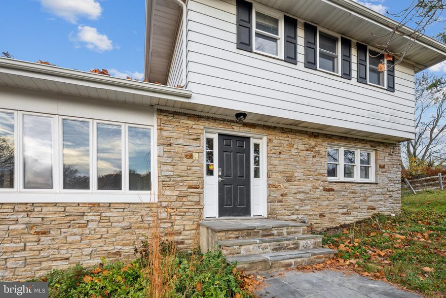 Located on 3.5 acres with an in-ground pool this delightful home located in sought after Catonsville will surely impress. This private fenced-in property is the last house on the road, and surrounded by woods with picturesque views, great for summer gatherings.   Embrace the tranquility of the back yard with a patio, fire pit, pool, and hot tub to create your own private retreat.   Accessible local riding trails and a barn with 8 horse stalls creates a horse lovers dream.  

As you enter through the unique stone front the open floor plan and floor to ceiling windows greet you with an airy, light filled space. The expansive sunroom can be used as an additional family room, work out room or children's playroom.  With 4 bedrooms including a main level bedroom makes this home ideal for any family size. Take pleasure in the gourmet kitchen which is a haven for aspiring chefs with high end cabinets and counter tops. Cozy up with a book and hot cocoa in front of the huge stone fireplace that will be sure to offer plenty of warmth during the upcoming cooler months. Private driveway with new horseshoe turn around.  With space for all family members, this home has everything you will need to make memories that last a lifetime. Conveniently located to many amenities and outside recreation.