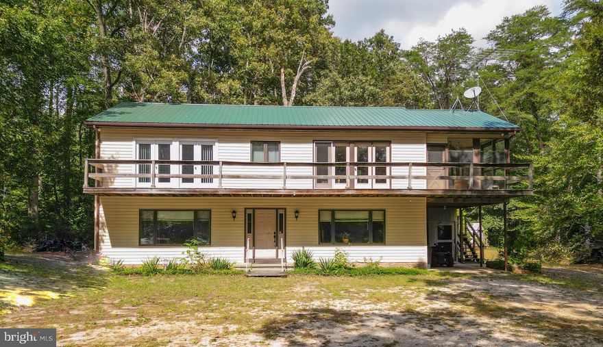 This two-story home with 400 feet of waterfront of the beautiful Choptank River -- pier to enjoy fishing and boating from your own backyard!  Has a rustic ramp to launch your canoe, kayak, and some boats as well as for swimming.  A 4' wide pier is great for launching your watercraft and/or sitting on in the early mornings or late evenings, just enjoying the beauty of the river and the sounds of nature!  Very private -- no homes in sight except for two across the river.  A large full-length deck on the upper level.  A 3-season room off the kitchen/dining area to enjoy most all year round -- could be made into a 12-month room by buyer.  Long one-quarter driveway to this serene property.  Lots of birds and wildlife to enjoy when not out on the River.  This home also has an elevator from the ground level to the upper level -- huge help for carrying small children, groceries, bulky items, etc., to the upper level.  Come see and enjoy the serenity!  Waterfront property is very scarce to purchase -- put your offer in now.

NO UNSCHEDULED VISITS -- NO DRIVEBY ALLOWED.