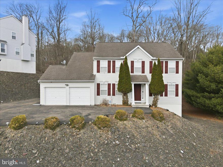 Welcome to your ideal retreat in the heart of the Poconos, located in the Country Club of the Poconos and within the East Stroudsburg School District. This 4-bedroom, 2 full and 1 half bath home offers the perfect blend of space, comfort, and low-maintenance living--ideal for a primary residence, vacation home, or investment property. Inside, you'll find a bright, functional layout designed for both everyday living and entertaining. Natural light fills the main living areas, creating a warm and inviting atmosphere throughout. The unfinished 1,256 sq ft walk-out basement provides exceptional potential--perfect for a future game room, family room, home theater, gym, or any space that fits your needs. It's a blank canvas ready to expand your living area and add value. Outside, enjoy a zero-maintenance yard, giving you more time to relax and enjoy the surrounding area without the upkeep. Minutes to Great Bear Golf Club, Shawnee Mountain Ski Area, and Shawnee Inn and Golf Resort, with quick access to Route 80, this location puts you at the center of year-round recreation including skiing, golf, hiking, and river activities, while also offering an easy commute to New Jersey and beyond. Whether you're looking for a full-time home, weekend escape, or income-producing property, this home offers flexibility and convenience in one of the Poconos' most well-known communities. *Some Images are Virtually staged*