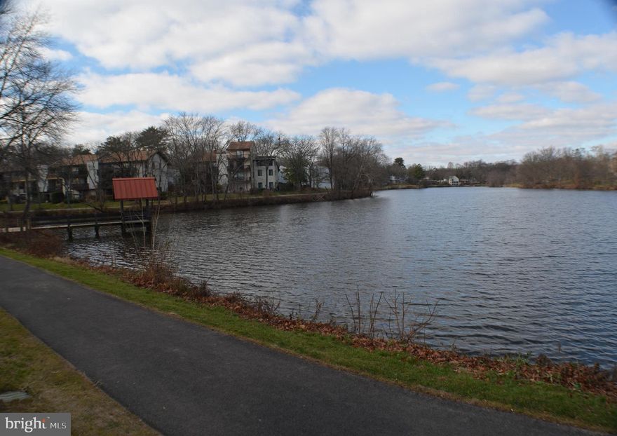 LAKE VIEW PROPERTY! COMPLETELY RENOVATED GROUND-LEVEL ONE BEDROOM, 1 BATH UNIT WITH WATER VIEW.  OPEN FLOOR PLAN OFFERS SEPARATE DINING/LIVING AREAS.  FEATURES INCLUDE GLEAMING HARDWOOD FLOORS THROUGHOUT,  RECESSED LIGHTING, STAINLESS APPLIANCES & QUARTZ COUNTERTOPS.   EVERYTHING IS NEW!  NEUTRAL PAINT COLORS THROUGHOUT. BEDROOM OFFERS TWO CLOSETS, ONE LARGE WALK-IN CLOSET FOR EXTRA STORAGE.  RELAX & ENJOY YOUR MORNING COFFEE ON THE PATIO TAKING IN THE LAKE VIEW!  RENT ALSO INCLUDES USE OF THE COMMUNITY POOL AND TWO TVs IN THE UNIT.  LAUNDRY IN SAME BUILDING, RIGHT NEXT DOOR FOR YOUR CONVENIENCE, ALONG WITH AN EXTRA SECURE STORAGE SPACE AND ONE RESERVED PARKING SPACE.  OWNER PAYS CONDO FEES. COME TAKE A LOOK, YOU COULD BE HOME! NO PETS; APPLY ONLINE.