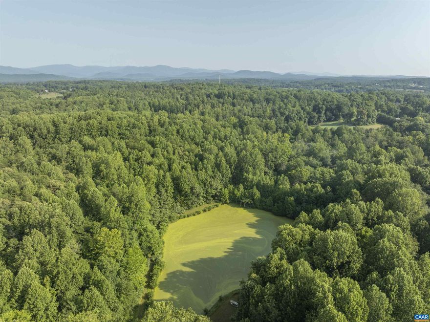 186 private acres located on Oak Park road, minutes from the town of Madison, and easy access to route 29. The land is very private with pastoral and mountain views, and includes a 1.5 acre stocked pond. The land is in three tax map parcels, and does have additional division rights, making it ideal for a conservation easement. The property includes a 1960s ranch house, and other dependencies, all in need of renovation. Roughly 15 acres are open, and the remainder are in mixed hard woods.