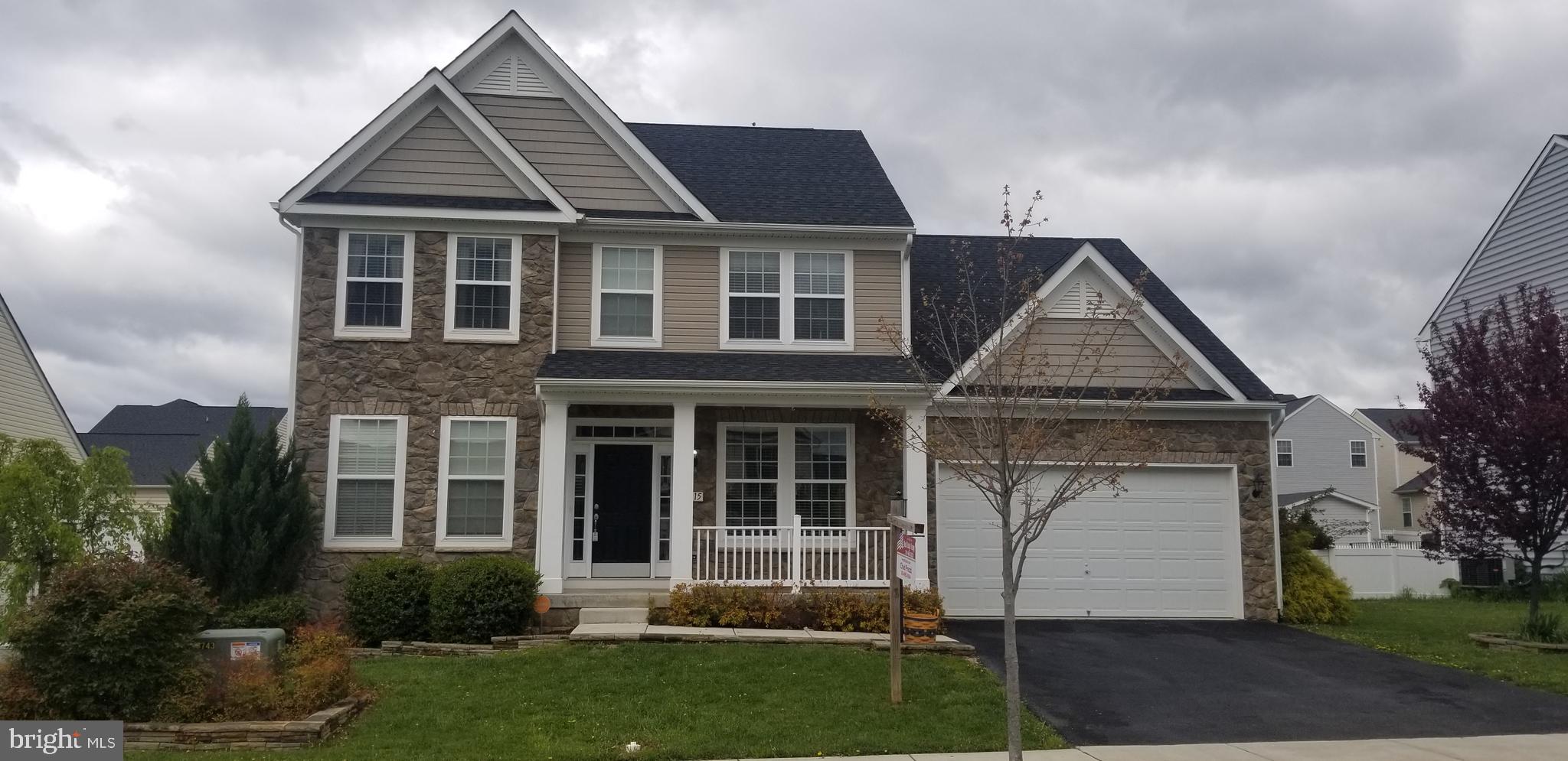 This beautiful colonial lacks nothing. The owner had just about every upgrade available added to this house. Some of the upgrades include, stone front, morning room, granite countertops, stainless steel appliances, hardwood floors, ceramic tile floors, double sinks in both the master and hall baths, tray ceiling in master bedroom, 8' wide basement stairway and stamped concrete patio. She also added vinyl and invisible fencing along with a storage shed in the backyard. The basement has a very large finished rec room and an unfinished storage area. Basement also has a full bath rough in. The sellers were in the process of finishing it before they decided to move. Most all of the materials have already been purchased and will convey. All appliances will convey. The sellers are in the process of moving most everything out. So there will be a few misc things laying around.