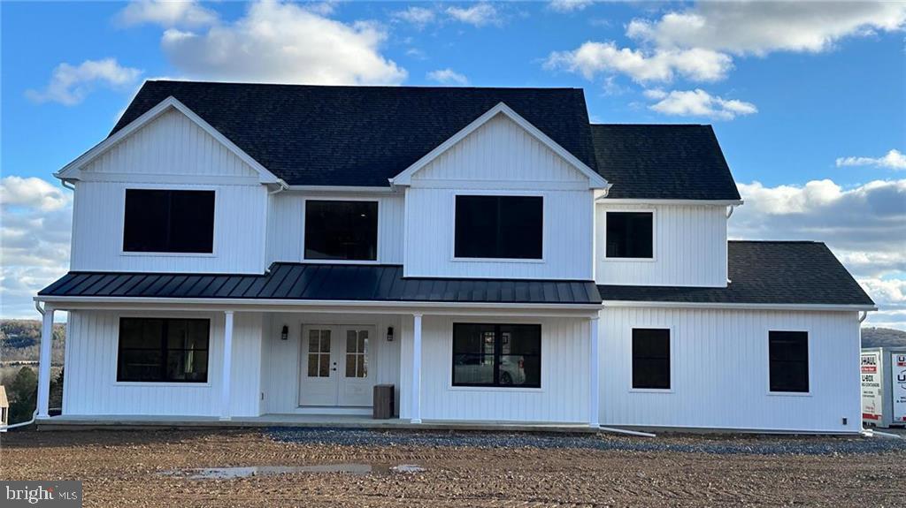 Fairview Farmhouse model to be built (Also see completed spec home on lot 9) . Welcome to Sage Meadows, a beautiful 10 lot subdivision in Mahoning Township. A stunning & spacious option, this home balances modern finishes w/ traditional charm across a sprawling 2,929 sq. ft. floorplan on 1.4 acres. You’ll find plenty of room for entertaining or relaxing, w/ formal & casual living & dining spaces & custom kitchen. Beautiful 42-inch cabinets, upgraded appliances including wall oven/microwave, cooktop, farm sink, upgraded granite or quartz counters & subway tile backsplash. A grand staircase leads you up to the 4 bedrooms, each spacious w/large walk-in closets & primary suite boasting a custom tiled shower. Lifeproof laminate floors throughout (exc. bedrooms). Many add'l upgrades including Black Pella windows w/wood clad interior, propane fireplace, barn doors, dual central cooling/heating and more! Well & Septic. Located under 3 miles from LVHN-Carbon, St. Lukes, & Route 443 shopping. Take a quick drive & visit charming Jim Thorpe & the Asa Packer Mansion Museum or explore nearby Blue Mountain Resort offering year-round hospitality & stunning views. Sit back at a local winery or at Penn’s Peak for live music or have an active day skiing, swimming, boating or fishing. Enjoy easy access to Route 209, Rt 248 & PA Turnpike Rt 476, all under 6 miles. Quick commute to Allentown, Philadelphia, NJ & NY. This serene setting blends modern conveniences w/easy access to endless amenities. Ready to build your dream home? Call today!