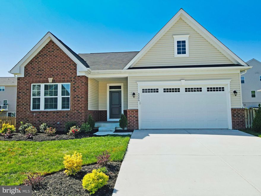 Welcome To 5506 Ivy Hill Dr Where You Will Find A Meticulously Maintained 4 bedroom, 3 Bath Main Level Living Rambler Boasting Over 2500 SQ FT Of Living Space All Nestled In The Amenity Filled Lees Parke Community. With A Nicely Landscaped Exterior, Brick Accent Front & Fenced In Yard, This Spacious And Bright Home Is One You Do Not Want To Miss. Wide Plank Laminate Floors Greet You At The Front Door & Lead You Into The Open Concept Family Room, Dining & Kitchen Area. The Family Room Provides A Relaxing Atmosphere With Bright Natural Light, Recessed Lighting And Ample Room For Entertaining. The Kitchen Boasts A Large Island, Quartz Countertops, Shaker Cabinets, Soft Close Drawers, Stainless Steel Appliances, Loads Of Prep Space & A Charming Dining Area. This Main Level Living Home Also Comes With A Large Primary Bedroom  Boasting Its Tray Ceiling & En-Suite Which Is  Host To A Tiled Shower, Tiled Floors, Double Bowl Vanity & A Large Walk-In Closet. 2 Additional Spacious Bedrooms,  A Full Hall Bath With Tiled Floors & Shower Walls and Quaint Laundry Room Finish The Main Level. The Basement Level Is Host To A Large Recreation Space, Freshly Designed Dry Bar With Loads Of Cabinets, Quartz Countertop & Game Area, Spacious Bedroom With Walk In Closet, Full Bathroom & Additional Unfinished Area.  Minutes From The Spotsy VRE, I95, Shopping & So Much More!!!