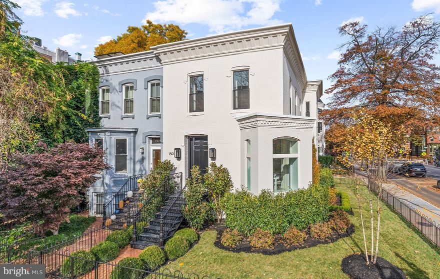 NEW PRICE! Exquisitely reimagined by Akseizer Residential, this impeccably appointed Victorian end-of-row townhome showcases a new level of grandeur in northwest section of DC’s Logan Circle neighborhood. Meticulously renovated to the highest of standards and utilizing quality designer finishes and fixtures, this sprawling 3 Bedroom, 3.5 Bathroom semi-detached residence boasts unparalleled luxury living across 3 fully finished levels and 3,118 total square feet. Originally built in 1870, this Akseizer masterpiece has undergone a completely custom renovation to deliver a breathtaking property that honors the architectural integrity of the home’s original design while seamlessly integrating the coveted luxuries of a discerning modern lifestyle. Inside, elegant moldings, timeless trim, beautiful built-in furniture, and gleaming hardwoods are complemented by soaring ceilings and abundant natural light from the three exposures. Outside, privacy abounds with full fencing encompassing the exquisitely manicured lawns with extensive plantings and patios while a sprawling rooftop deck showcases magnificently panoramic city views. Debuting highly sought-after and rarely attainable outdoor amenities and interior living spaces, this one-of-a-kind jewel truly has it all. An urban convenience sure to delight any city dweller, this bespoke residence provides 2 private, off-street gated parking spaces.