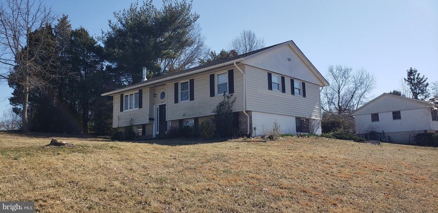 Fantastic, wonderfully maintained, 3 or 4 bedroom split foyer now available. Off-street parking for several cars, and adjacent court adds lots of additional parking. Gleaming wood floors throughout the bedroom level. Redone kitchen with newer stainless appliances and granite countertops. Large remodeled bathroom. Huge lower level with rough-in for wood stove in large club room. Additional space could be storage, but owner used as an oversized bedroom, with laundry in room. Both levels walk out, upper level to large deck, lower level to patio. There truly is space for everyone here, with ample storage in addition. Come see it soon, won't last!