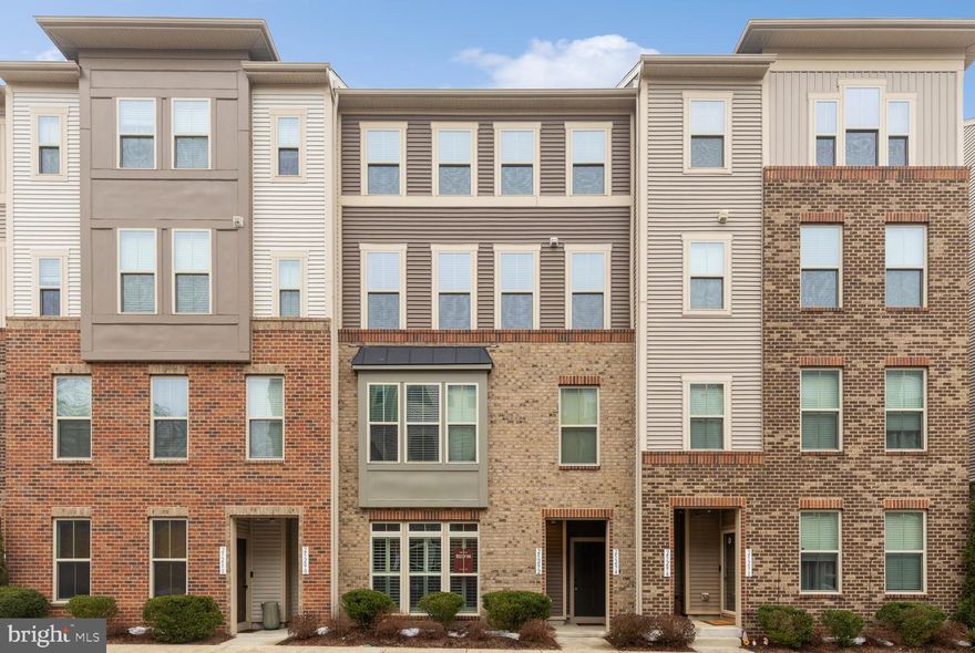 OPEN Sat Feb 21, 12:00PM-2:00PM *** Surprisingly spacious! This condo lives like a single-family home, offering over 2,600 sq ft of bright, thoughtfully designed interior space. Lovingly cared for, the PICASSO model showcases a modern, open top-floor layout that is both stylish and inviting.  Easy living at it's best!
The main living area features a seamless blend of scraped oak hardwood floors in Kitchen, Great Room/ Dining Area and1/2 bath and plush carpeting in Living Room (large enough to include another Dining area), creating a large, versatile gathering space filled with natural light. Highlights include abundant windows, an open stairwell to the upper level & a convenient half bath. The gourmet kitchen impresses with recessed lighting, scraped hardwood floors, stainless steel appliances, double ovens, granite countertops and a spacious island with pendant lighting & generous bar seating. There is also ample room for a dining table, plus the added bonus of a large double-door pantry and a service bar/desk area. 
The Family Room  off the kitchen is warm and welcoming with expansive windows, a gas fireplace with mantel & a TV mount already in place. Step out to the deck directly from the kitchen/family room—perfect for relaxing or entertaining. 
Upstairs, the primary suite is a true retreat, featuring a sitting area, coffered ceiling, recessed lighting, and two walk-in closets. The spa-like primary bath offers a soaking tub, separate shower, dual vanities, and abundant natural light. The second and third bedrooms are generously sized & include large closets - 1 with walk-in closet - both bedrooms are larger than many found in detached homes.  Also, a convenient bedroom-level laundry room with full-size front-load washer and dryer and cabinetry with folding counter space.
Parking includes a one-car garage with opener plus one driveway space, along with plentiful street parking for guests.  Added bonuses include ceiling fans, high ceilings, generous sized garage, 
This  home is located in Loudoun Crossing in Aldie, VA, where residents enjoy exceptional amenities centered around the Loudoun Crossing Club, including a resort-style swimming pool, state-of-the-art fitness center, tennis courts, miles of trails, 2 tot lots in the condo area, and sidewalk-lined streets. Easy access to major arteries, entertainment areas, parks and quick trips to all the necessities of life.