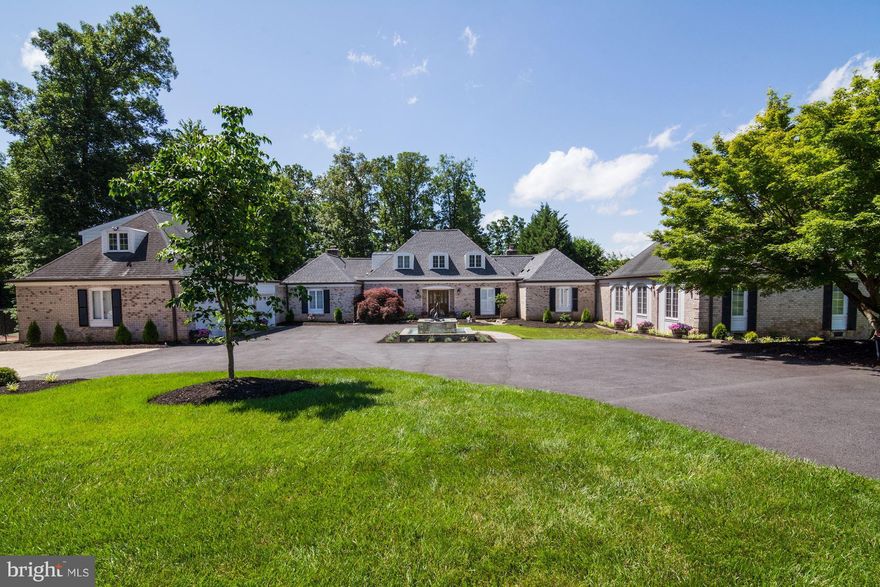Estate home in sought after Manors of Fox Mill. 5 BR, 6 full BA, 2 half BA, & 3 car garage. 5,966 sq ft w/perfect flow for entertaining. Formal DR, LR. Chef's KIT w/isld & bfast rm. Sunroom w/wet bar. Rare main lvl living w/ LUX owner s suite w/fp, dressing area & spa-like BA. Private resort-like yard w/deck, patio, pool, tennis, ext. hardscaping. In-law suite. Fin LL w/rec rm, sauna, full BA.