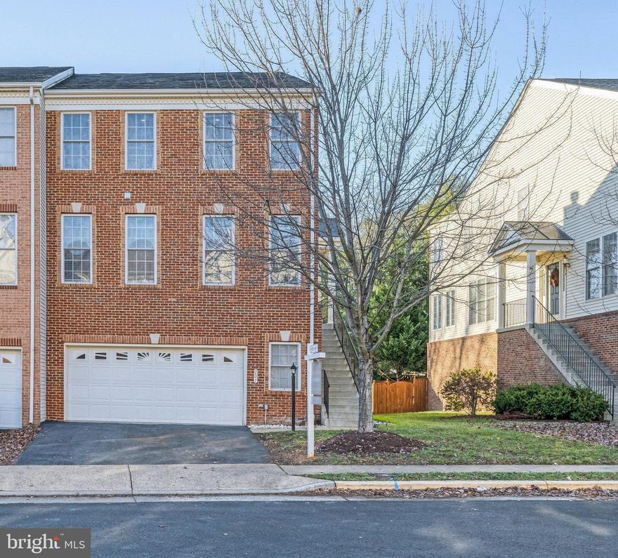 Welcome to this stunning brick-front end unit townhome nestled in the sought-after Purcellville Ridge. Boasting over 2500 square feet of meticulously designed living space, this residence offers a perfect blend of modern luxury and comfort. Upon entering, be greeted by newer luxury vinyl plank flooring that leads you to a bright and airy ambiance throughout. The main level features a spacious gourmet kitchen, adorned with granite countertops, stainless steel appliances, a butler's pantry complete with a wine rack, perfect for the connoisseur. Cozy up by the wood-burning fireplace in the living room, creating an inviting atmosphere for gatherings and relaxation. The upper level is adorned with luxury vinyl plank flooring, hosting a generous primary suite featuring a huge walk-in closet and an ensuite bath with a luxurious soaking tub, ensuring a tranquil retreat after a long day. Additionally, this level offers two more well-appointed bedrooms, a full bath, and the convenience of a laundry room. The lower level continues the trend of luxury vinyl plank flooring, complemented by a full bath and a walk-out access leading to the fully fenced back yard. Enjoy outdoor entertaining on the deck, creating an ideal space for relaxation and al fresco dining. Convenience meets luxury with an oversized garage, ensuring ample storage space. Situated in a prime location within the town, relish in the proximity to various stores, breweries, boutiques, and dining options. Embrace the community atmosphere with a farmers market on weekends and easy access to the W & OD trail for outdoor enthusiasts. Don't miss this opportunity to own a sophisticated townhome offering both elegance and functionality in a vibrant and desirable neighborhood.