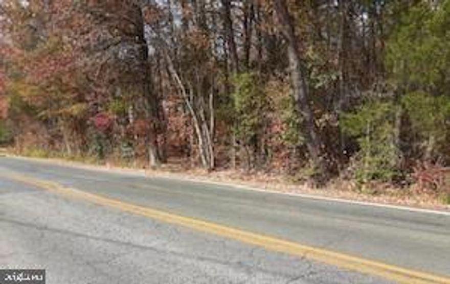 0.77 ACRE LOT ZONED MIX-USE IN BRYANS ROAD. LOT LOCATED ON NORTH SIDE OF MATHEWS ROAD (OLD INDIAN HEAD HWY.)ADJACENT TO RT. 210, IDEAL SITE FOR BUSINESS OR OFFICE.