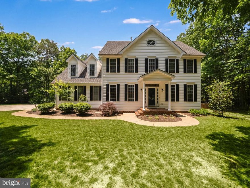 OFFER DEADLINE; SUNDAY MAY 30TH 12:00PM  PLEASE COPY CO AGENT ON OFFER EMAILS.  Extraordinary Colonial in sought after Estates of Chancellorsville. This beautiful home boasts over 3,900 finished square feet on a mature wooded 2.19 acre lot. Home sits back down a long paved driveway with additional parking and 2 car side load garage. Entering the home you will find new hardwood floors, newly painted interior, updated kitchen with granite counters, brand new updated bathrooms plus all new lighting fixtures. There is no carpet in this home, all solid surface flooring through out. Fully finished basement is perfect for all your recreation needs and offers an optional fifth bedroom (not to code)and a full bath.  Partly wooded back yard with shaded play area and perfect area to add a pool.