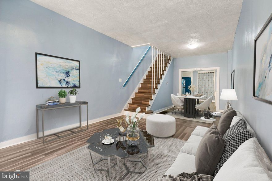 Great opportunity to own a bright and spacious renovated home with New Roof installed this past summer in Baltimore City. Tastefully designed with luxury vinyl plank flooring throughout with spacious living and dining rooms that lead into your updated kitchen with 2 New stainless steel refrigerators, gas range oven, and microwave. Upstairs are two spacious bedrooms, a full bathroom, and ceiling skylights.  The lower level has been freshly painted with New full size washer and dryer and  lots of room for storage.  Outside enjoy entertaining family and friends in your long fenced-in back patio. The Hot Water Heater is 2 years old and the HVAC was recently replaced.   Walking distance to shops and dining, and easy access to Route 40 and 95. This home is move-in ready! Don’t miss out, schedule your tour today!