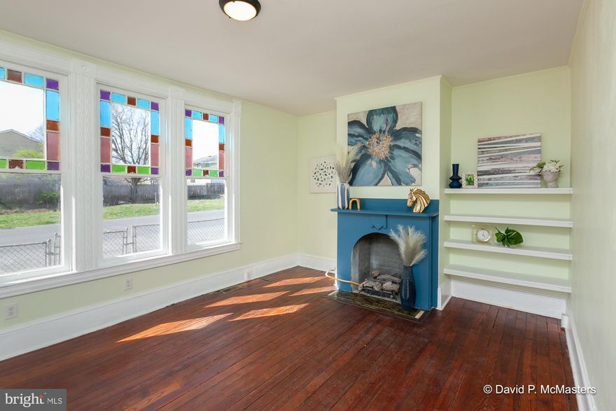 Amazing opportunity under $250,000.00! Seller willing to offer partial owner financing!. Corner Lot.  BEAUTIFUL stain glass windows.  HUGE covered front porch.  Original trim and banisters.  AMAZING kitchen with large island and granite counter tops.  Refinished wood floors.  Brand new appliances!