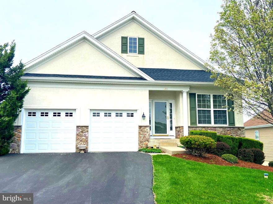 EXPERIENCE RESORT-STYLE LIVING IN THE VILLAGES AT HILLVIEW, CHESTER COUNTY'S PREMIER ACTIVE ADULT COMMUNITY, where 10% of residents can be 45 years or older, and the amenities are top notch!  Top that off with a stunning home that has been beautifully maintained and upgraded, and you've found your dream home in your desired location.    This home backs to community green space with lovely views from the deck & the concrete patio beneath the deck.  When you enter the foyer on a marble floor you'll find French Doors leading to the front-facing office/den and elegant wainscotting .  Hardwood floors take you back to the oversized living / dining room combo where the wainscotting and flooring continue to impress.  This graceful space is enhanced by 2 impressive bay windows adorned with custom Plantation Shutters!  The stunning dining room chandelier is "the icing on the cake" for this remarkable space.  Next, the hardwood flooring flows into the heart of the house...the kitchen & family room.  You'll love the efficient gourmet granite kitchen with a 6-burner gas cooktop and two wall ovens, upgraded cabinetry, a convenient desk area, a S/S refrigerator, and a handy pantry.  Along with the island seating, the ample dining area will accommodate lots of casual company.  The kitchen overlooks the cathedral family room with a granite surround fireplace.  The owners had the mundane builder fireplace removed and replaced with beautiful gas logs, a granite surround and glass doors that can be opened to take full advantage of the warmth and ambiance of the fire.  The upgraded back door, with its leaded glass window, takes you to the composite deck that overlooks greenspace.  Relax under the electric awning on warm summer days on this QUIET DECK AWAY FROM ROAD NOISE.  Come back in to the bedrooms and baths...follow the hardwood flooring into both bedrooms.  The primary suite is spacious and has room-darkening pleated blinds and walk-in closets.  The tiled bath has a large shower stall, a corner soaking tub and a double-bowl vanity, plus a window for natural light & ventilation.  The cozy second bedroom reminds me of a guest room in a B&B, with lovely light streaming in during the day & room-darkening blinds for a good night's sleep.  The hall/guest bath has a ceramic tile floor, a decorative matching sink and toilet, and a shower/tub combo.  The laundry room comes equipped with awesome raised matching front-load washer & dryer and  an included utility tub, all atop a ceramic tile floor.  The 2-car garage floor has been epoxied and the whole-house vacuum cleaner tank is conveniently wall-mounted there.  The steps to the basement are carpeted - the only carpet in the house!  The unfinished walk-out basement has a gas-fired stove that comfortably heats a good portion of the basement.  It's a blank slate for finishing to suit your needs or leave it as is and use for storage, a place to bring the dogs in and out with wet feet, a play area for the grandkids, workout or workshop..you decide.  This exceptional community is brimming with myriad amenities designed to enhance your lifestyle.  Stay active on the courts playing tennis, pickleball or basketball, or in the state-of-the-art FITNESS CENTER or simply relax by the pool, or find a great restaurant to dine with neighbors & friends, Hillview has it all. Throw away your mowers & snow shovels...the HOA takes care of everything for you & even clears snow right up to your front door...Just move in & make friends. With easy access to local shopping, dining, golf, & medical facilities, you will find that Hillview is a great location for providing for your social, medical, shopping & gastronomical needs. Hillview is located approx. an hour away from the Philadelphia International Airport, the Wilmington (DE) Airport, and the Harrisburg International Airport and within 10 minutes of the Thorndale SEPTA train station.  Come for a visit to see what all the excitement is about and what you have been missing.