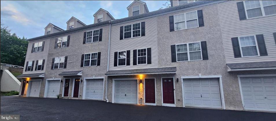 Welcome to 238 East Gay Street #4, an exceptional residence nestled in the heart of downtown West Chester Borough. This home is one of only six in the prestigious Dow Village Complex, offering unparalleled convenience and style. Recently adorned with fresh paint and new carpeting throughout, this 1998-built gem boasts over 1300 square feet of well-designed living space. Revel in the comfort of three bedrooms, 1.5 bathrooms, and the added luxury of a garage—a rare find in this prime location. Step inside at garage level, where you'll discover the HVAC and water heater tucked away. This level also provides ample storage space and houses the convenient laundry hook-up. Ascend the stairs to the next level, revealing an inviting open kitchen, a convenient half bath, and a living room. The subsequent level unveils two bedrooms and a full bathroom, ensuring a seamless flow throughout the residence. Finally, the top level presents an expansive area perfect for a third sleeping space or a home office—adding versatility to your living experience. This townhome offers more than just a comfortable abode; it provides immediate access to a vibrant neighborhood filled with numerous restaurants and bars. Enjoy the best that the Borough has to offer, right at your doorstep.