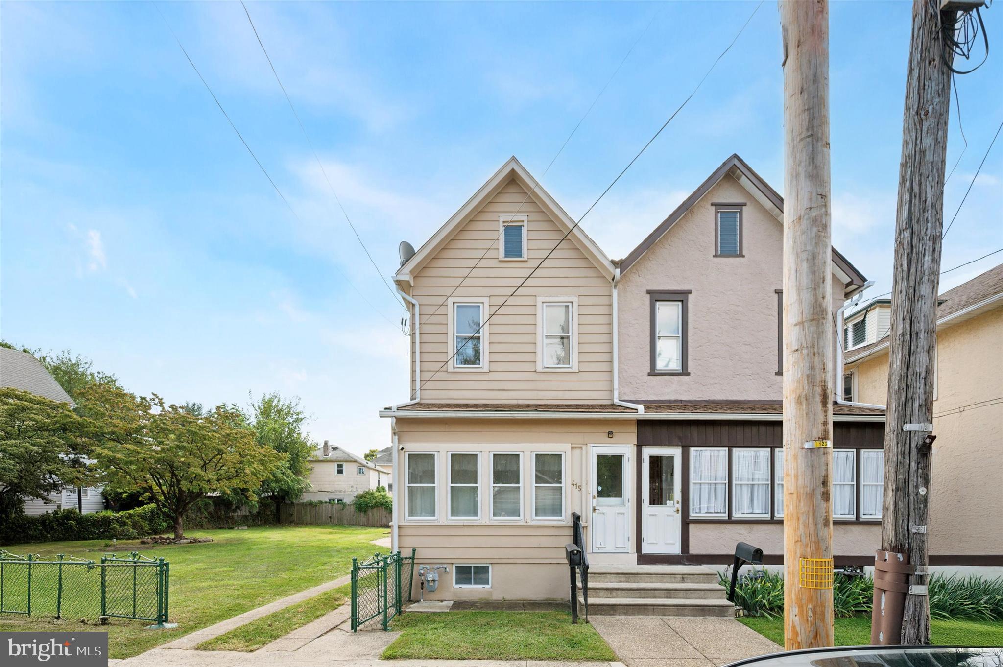 Welcome to 415 Manhattan Street, a rare opportunity in the heart of Essington. Situated on a double-wide lot with two separate tax parcels, this property offers exceptional space, privacy, and versatility, features seldom found in this neighborhood. From the moment you arrive, the curb appeal stands out. A well-maintained street with sidewalks, a fully fenced front and side yard, and a gated driveway that leads back to a detached two-car garage. The oversized lot provides plenty of room for gardening, outdoor entertaining, or simply letting pets and family enjoy the outdoors safely.
Step inside through the sun-filled enclosed front porch, a perfect spot to enjoy morning coffee or an evening read. Beyond the sunroom, the main level opens into a spacious living room with high ceilings and flows into a dining area. The updated kitchen, complete with a cut-out counter that functions almost like an island, is perfect for both everyday living and entertaining. A large laundry room and a convenient half bath complete the first floor.
Upstairs, you’ll find three generous bedrooms and a updated full bathroom. The home also boasts newer windows throughout, adding efficiency and natural light. The full unfinished basement provides abundant storage and finish potential for a future recreation space, home gym, or workshop.
What truly sets this home apart is its location. Essington offers small-town charm with unmatched convenience. Minutes from I-95, Philadelphia International Airport, Center City Philadelphia, and the Delaware waterfront. Enjoy nearby parks, marinas, and local dining while still being tucked into a quiet residential street.
Lovingly maintained by its longtime owners, 415 Manhattan Street is ready for its next chapter. With its double-wide lot, detached garage, and ideal location, this home represents a rare chance to own a property that offers both comfort and value.