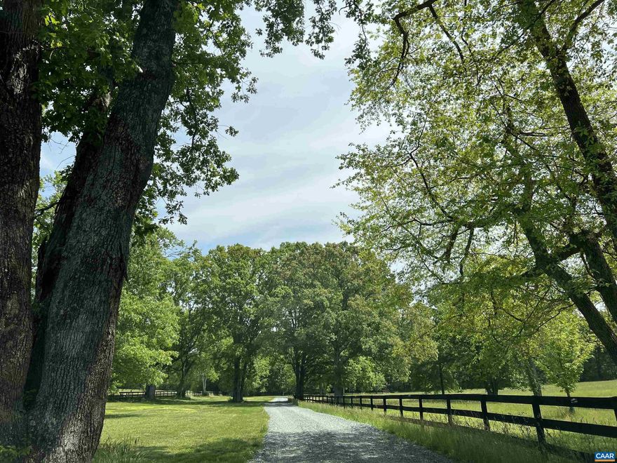 Stunning estate with 20 wooded acres with division rights.....including a 10 stall barn and a 2 bedroom cottage...Fabulous, first floor master suite addition with fireplace, custom closet & extravagant walk in shower....beautifully updated kitchen featuring Yaeger and Ernst cabinetry, Wolf appliances... ask for extended list of property details. The 15x30 screened veranda is amazing extended living space, including a widescreen TV, and a view of the neighboring pond...Peace and tranquility define the property...walls of windows, a brick interior walkway, sunken den and breakfast room open to the kitchen and exterior terraces and pool...Comfortable, large formal rooms with floor to ceiling windows embrace the expansive setting...,Granite Counter