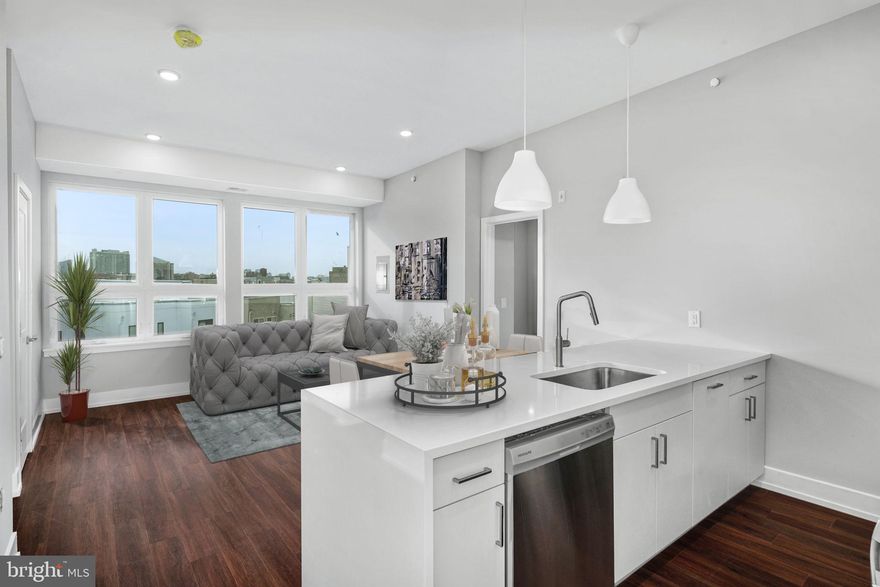 Bright and sunny Apartment! Gorgeous newer construction building in the BOOMING Francisville neighborhood. Walk to everything, Center City, Fairmount, Northern Liberties, Temple University and only a 3 minute walk to the Broad St Subway Fairmount Stop. Apartment features huge window with lots of natural light, beautiful flooring, modern bathrooms, high end appliances with 5 burner gas range, central air and in unit washer and dryer and tankless water heater! The elevator brings you right up to the roof deck which has breathtaking views of the Center City Skyline. Secure building with an elevator for convenience. Water Included in rent. Photos are of units with same finishes.