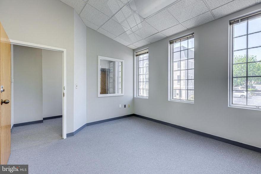 Bright second-floor end unit in Sought-after Fairfax Commons with five total offices, four naturally light-filled offices with vaulted ceilings, a kitchenette with a sink, a bathroom, and a utility closet. New windows. Walking distance to Fairfax Courthouse, in the heart of Old Town Fairfax! It is in excellent condition, has a perfect floor plan, and plenty of unassigned parking. Magnificent Views from each office. Easy Access to the CUE bus(GMU to Vienna Metro Station) & Old Town Village/Main St. Marketplace!! Commercial Condo with CR Zoning.