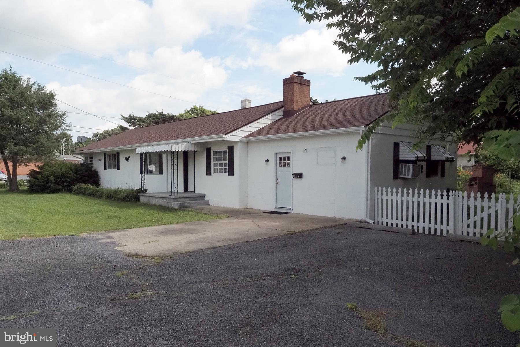 Nestled on a corner lot in Ranson WV, with easy walking to Ranson and Charles Town, this two bedroom one bath duplex with a separate fenced back yard landscaped with flowers and a patio offers a quiet respite after work . The large kitchen with a non-functional fireplace offers a spacious area for cooking and dining along with the included washer and dryer. A few steps up from the dining room are two bedrooms, a living area with sliding glass doors to the back yard and the bathroom. The location is within easy access to commuter routes to Virginia and Maryland and major employment centers to include American Public University, WVU Hospital, and Hollywood Casino.
No Pets/No Smoking. The non functional fireplace is decorative only.
Interested parties are required to fill out the online application which includes anyone over 18 years of age that will be living in the rental unit.