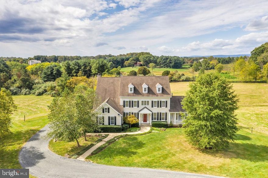 Stunning light filled estate home on 9+ acres situated at end of private lane offers glorious sunsets and views. Just south of Purcellville and north of Middleburg this 4 bedroom, 4.5 bath colonial features hardwood floors, professionally designed large gourmet kitchen which opens to the family room with stone fireplace. Large sunroom has 2nd fireplace, french doors leading to living room, front porch and separate back deck.  Home has custom cabinetry, tilework, granite, and incredible storage.  New paint throughout! Incredibly finished lower level perfect for in-law/WFH/home school/au pair includes terrific natural light, full kitchen with granite, custom cabinetry, spa bath, built-in bookcases, separate laundry and pantry. Also included 2 new HVAC systems and new hot water heater. Exterior offers Hardiplank siding, all exterior trim freshly painted and caulked, an extensive 3 tier Trex deck for outdoor entertaining, and 9+ acres for your enjoyment. NOTE: Property is located at the end of a private lane off of Greggsville Rd.  You will see the address of the property listed on the sign at the beginning of the lane.
