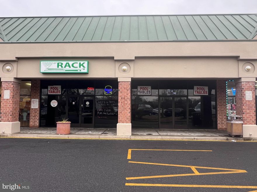 The Pecan Square shopping Center is home to Food Lion, Apple Drug , The Deli at Pecan Square, Busters and more. We have a 2800SF unit that has a built in bar, tables, chairs and booths ready for immediate occupancy. There are 2 bathrooms, an office and a kitchen that can be almost doubled to accommodate more equipment.  This unit could be used for restaurant/bar, retail, office space or many other uses.