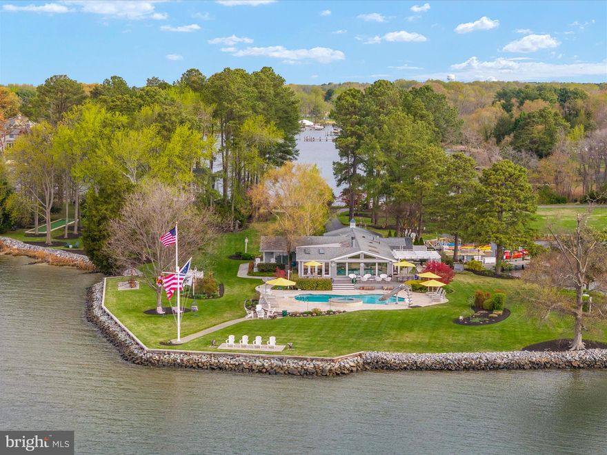 Welcome to 111 Murphy Lane!   Presenting an extraordinary waterfront estate that offers a truly exceptional living experience!  Almost an island connected only by the driveway, every single  room has a direct water view. With a host of luxurious features and amenities, this estate is truly a one of a kind waterfront property. 

The newly decorated Main House, exudes elegance and sophistication, and is the start of a property designed for warmth and also entertainment !  
With three bedrooms and three bathrooms, this residence offers a spacious and comfortable living environment. The open floor plan creates a seamless flow between the living spaces, enhancing the sense of togetherness and making it perfect for entertaining guests. The main house also features a double-sided gas fireplace, providing warmth and ambiance on cooler evenings.

Step inside the main house and discover a conditioned sunroom, inviting you to relax and enjoy the panoramic views in complete comfort. Outside, the huge ipe wood deck , offers a stunning retreat where you can bask in the sun or entertain guests. Misting fans surrounding the deck provide a refreshing breeze on hot summer days. The House also has a **** Pool/Spa that stares right at the bay which is right there at the point of the property.

Indulge your culinary desires in the outdoor kitchen, equipped with top-of-the-line appliances and amenities. Additionally, the main house boasts a massive commercial size pizza oven that can be fueled by propane or wood.  For added convenience, an outdoor shower is available, providing a refreshing oasis after a day spent on the water.

The Guest House, , offers a separate and private living space. With four bedrooms and three bathrooms, this residence provides ample room for guests or extended family members. The high ceilings create an airy and spacious atmosphere, while the guest house's own septic system ensures independence and privacy.

Both houses are equipped with Generac whole house generators, ensuring uninterrupted power supply. The property features an irrigation system, LED landscape lighting enhances the beauty of the surroundings, creating a captivating ambiance during evening hours.

For boating enthusiasts, the property includes a dock with two boat lifts and open slip, additional floating pier for jet skis and kayaks and a private boat ramp, providing convenient access to the water that is tucked away in a cove to protect your boat from storms with 5 foot MLW. Additionally, a separate floating dock offers even more flexibility for water activities. A boat ramp is also available, making it easy to launch watercraft at your leisure.

The estate which is landscaped like a small resort even features a bocce court, perfect for friendly competitions and outdoor entertainment. With meticulous attention to detail and an array of exceptional amenities, this waterfront estate offers a truly remarkable living experience.

Immerse yourself in the beauty of this property, surrounded by nature and serenity. Contact us today to arrange a private tour and discover the endless possibilities that await you at this extraordinary waterfront estate.