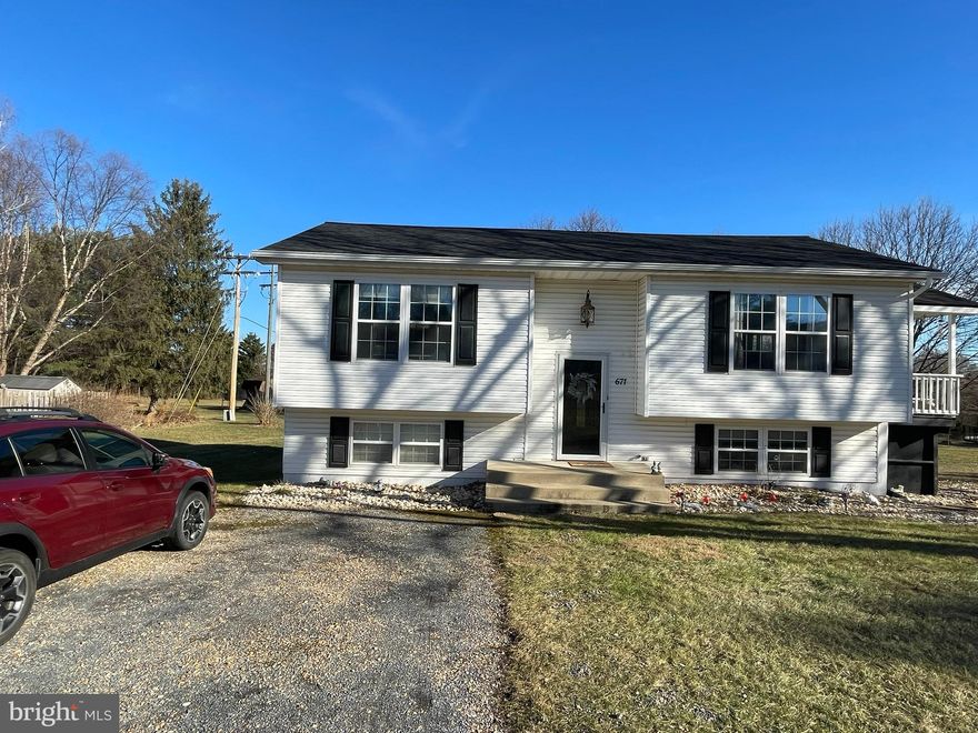 No Sunday showings. Split foyer that consists of 4 bedrooms and 2 full baths. Wonderful covered back deck to take in the views. Kitchen boasts granite countertops and stainless steel appliances. There is plenty of dining space for a large kitchen table. Luxury vinyl plank flooring, ceramic tile, and carpet throughout the home. Laundry on lower level. Property is in great condition and ready for the next buyer.

Michelle Shroades, owner is a Butler Brokerage agent.